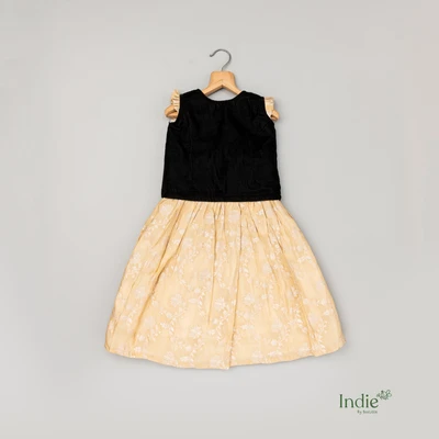 Black Velvet Top And Golden Embroidered Beige Skirt Choli