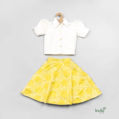 White Embroidered Top And Yellow Skirt